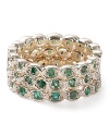 Set with emerald-colored crystals, Melinda Maria's pod ring is an easy-chic adornment. Stack this style to add impact.