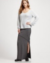 Lengthy, curve-hugging style with allover ribbing and a sassy side slit. Elastic waistband About 43 from natural waist 62½% rayon/18.8% cotton/18.7% polyester Machine wash Made in USA