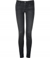 The ultimate must-have, these luxe jeans from It denim brand Mother are the favorite skinnies of the fashion flock - Classic five-pocket styling, stylishly faded washed black-grey denim, skinny leg - Form-fitting - Style with an oversized cashmere pullover, a wool cape, and platform booties