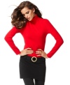 Get mod with INC's colorblocked tunic sweater. Pair it with leggings and knee-high boots for a sleek look!