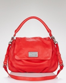 Give your accessories wardrobe a jolt with MARC BY MARC JACOBS' lipstick-red satchel. With its classic shape and cool hue, this bag strikes a balance between timeless and on-trend. Give your accessories wardrobe a jolt with MARC BY MARC JACOBS' lipstick-red satchel. With its classic shape and cool hue, this bag strikes a balance between timeless and on-trend.