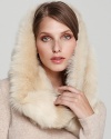 A plush genuine shearling snood from UGG® Austraila provides an elegant take on a popular winter style.