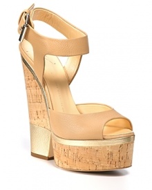 Cut-out cork wedges anchor gleaming leather. Pair Giuseppe Zanotti's elegant wedges with slim, cropped trousers. Cut-out cork wedges anchor gleaming leather. Pair Giuseppe Zanotti's elegant wedges with slim, cropped trousers.