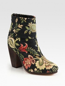 An on-trend floral-print canvas silhouette with a wooden heel and back zipper for easy access. Wooden heel, 3¾ (95mm)Canvas upperBack zipperLeather lining and solePadded insoleImported