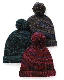 A large pom-pon tops this adorable slouchy knit hat by MARC BY MARC JACOBS.