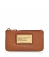 Add luxe style to the everyday with this leather key pouch from Marc by Marc Jacobs - Rectangular shape with round edges, top zip closure, front logo with gold-tone hardware, internal key ring detail, textured leather - Perfect for daily use or as a thoughtful gift