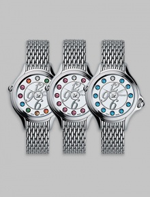Dazzling topaz stones accent this classic, stainless steel design featuring a unique rolling gemstone mechanism that changes the semiprecious markers for three different looks, with a single stationary diamond at 12.Swiss quartz movement Water resistant to 3 ATM Round stainless steel case, 38mm, (1.49) White dial Topaz and single diamond markers, 2.9 tcw Arabic numeral hour markers Bracelet strap Made in Switzerland Dazzling topaz stones accent this classic, stainless steel design featuring a unique rolling gemstone mechanism that changes the semiprecious markers for three different looks, with a single stationary diamond at 12.Swiss quartz movement Water resistant to 3 ATM Round stainless steel case, 38mm, (1.49) White dial Topaz and single diamond markers, 2.9 tcw Arabic numeral hour markers Bracelet strap Made in Switzerland