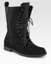 Edgy, combat-inspired look modernized by an extravagant pony hair upper, topped off with a side zipper and lace-up front. Pony hair upper Leather lining and sole Padded insole Made in ItalyOUR FIT MODEL RECOMMENDS ordering true size. 