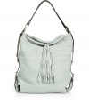 Luxe handbag in fine, ultra-supple white woven leather - Chic, over-the-shoulder tote style with zip top closure and adjustable strap -Folded bottom corners and oversize tassel embellishment lend the bag a slouchy, boho appeal - Lined in linen, with one small and one larger interior pocket - Relaxed yet polished, roomy enough to fit all of the essentials