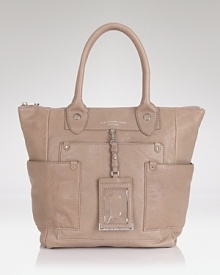MARC BY MARC JACOBS reconfigures the ultimate preppy staple in luxe leather. Boasting a classic silhouette and cool details, it's destined to be your new favorite tote. MARC BY MARC JACOBS reconfigures the ultimate preppy staple in luxe leather. Boasting a classic silhouette and cool details, it's destined to be your new favorite tote.