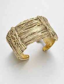 Simply stunning, this richly textured open cuff is formed of wrapped golden ropes for endless gleam and glamour.GoldplatedDiameter, about 2.7Width, about 1.6Made in France Simply stunning, this richly textured open cuff is formed of wrapped golden ropes for endless gleam and glamour.GoldplatedDiameter, about 2.7Width, about 1.6Made in France