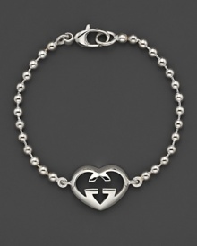 From the Love Britt collection, a beautifully-crafted sterling silver heart bracelet. Designed by Gucci.