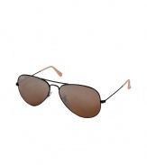 Originally designed for fighter pilots, Ray-Bans Aviator sunglasses are an iconic choice guaranteed to take you through the seasons in cool style - Black metal frames, crystal gold mirrored lenses, clear nose pieces, nude earpieces - Lens filter category 3, prescription friendly - Comes with a logo-stamped semi-hard carrying case - Amp up your look with a leather bomber jacket and edgy lace-up boots