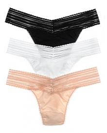 An essential thong with a great shape to flatter any body. The original thong has a beautiful sheer striped lace waistband and lace trim at legs in basic colors. Cotton gusset. An essential thong with a great shape to flatter any body. The original thong has a beautiful sheer striped lace waistband and lace trim at legs in basic colors. Cotton gusset.
