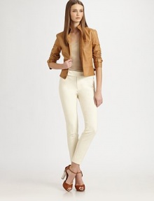 A chic button-front design, rendered in supple lamb leather and finished with buckle details.Stand collarButton front closureD-ring buckle tabs at side waistBuckle straps at cuffMulberry silk liningAbout 19 from shoulder to hemLeatherDry cleanMade in USA of Italian fabricModel shown is 5'10 (177) wearing US size 4. A chic button-front design, rendered in supple lamb leather and finished with buckle details.Stand collarButton front closureD-ring buckle tabs at side waistBuckle straps at cuffMulberry silk liningAbout 19 from shoulder to hemLeatherDry cleanMade in USA of Italian fabricModel shown is 5'10 (177) wearing US size 4.