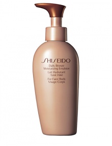 A gentle moisturizing emulsion for the face and body that promotes a gradual natural bronze color and dramatic silkiness with daily use. Creates subtle radiant color in a few days when applied daily. Maintains the beauty of a golden bronze glow longer when used each day on tanned skin. Absorbs quickly, moisturizers effectively, and leaves skin looking healthy and retexturized. Smooth emulsion evenly over face and body daily for best results. A gentle moisturizing emulsion for the face and body that promotes a gradual natural bronze color and dramatic silkiness with daily use. Creates subtle radiant color in a few days when applied daily. Maintains the beauty of a golden bronze glow longer when used each day on tanned skin. Absorbs quickly, moisturizers effectively, and leaves skin looking healthy and retexturized. Smooth emulsion evenly over face and body daily for best results.