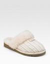 Warm and comfy wool design with shearling lining. Wool knit upper Shearling lining Padded insole Rubber sole ImportedOUR FIT MODEL RECOMMENDS ordering true whole size; ½ sizes should order the next whole size up. 