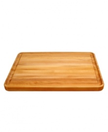 This handsome, substantial cutting board is twice as useful as a standard cutting board. One side features a convenient juice groove around the entire surface for collecting savory juices, perfect for homemade gravies and sauces, while slicing meats. The other side is smooth, perfect for chopping vegetables. Premium edge-grain construction and a rich, oiled finish deliver years of use. One-year warranty. This handsome, substantial cutting board is twice as useful as a standard cutting board. One side features a convenient juice groove around the entire surface for collecting savory juices, perfect for homemade gravies and sauces, while slicing meats. The other side is smooth, perfect for chopping vegetables. Premium edge-grain construction and a rich, oiled finish deliver years of use. One-year warranty.