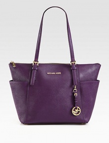 A polished design in luxurious saffiano leather accented with radiant hardware.Double adjustable shoulder straps, 8½-10½ dropTop zip closureTwo outside open pocketsOne inside zip pocketFour inside open pocketsFully lined10½W X 10H X 4½DImported A polished design in luxurious saffiano leather accented with radiant hardware.Double adjustable shoulder straps, 8½-10½ dropTop zip closureTwo outside open pocketsOne inside zip pocketFour inside open pocketsFully lined10½W X 10H X 4½DImported