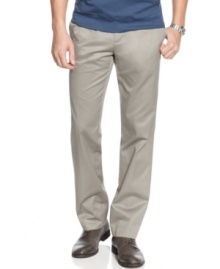 Cut in a modern slim-fit, these pants from Calvin Klein upgrade your casual Friday style. Cut in a modern slim-fit, these pants from Calvin Klein upgrade your casual Friday style.
