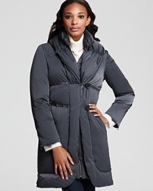 Winter warmth goes elegant with this luxurious Elie Tahari down coat, featuring a ladylike cutaway hem, drawcord shawl collar.