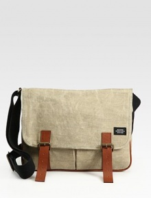 A sophisticated place to store all your daily must-haves in polished waxed linen and leather.Flap with buckle closuresAdjustable shoulder strapExterior front pocketsInterior zip pocketCanvas with leather trim12W X 13½H X 3DImported A sophisticated place to store all your daily must-haves in polished waxed linen and leather.Flap with buckle closuresAdjustable shoulder strapExterior front pocketsInterior zip pocketCanvas with leather trim12W X 13½H X 3DImported