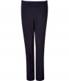 Stylish pants made ​.​.in fine, dark blue heather wool stretch - Cut slim, straight and long - With flattering pleats - Luxurious and casual at the same time - Button closure and zipper - Two diagonal side pockets - High quality and wonderfully comfortable - A favorite pair of pants you will wear for a lifetime - With a shirt to the office, cashmere pullover for leisure