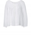 Stylish top in fine, white cotton and silk blend - Incredibly soft, lightweight fabric - Relaxed, ultra-feminine tunic cut crops at hips - Wide, round smocked neck and flattering pleat detail at chest - Casually elegant and boho chic, ideal for day or evening - Pair with cropped trousers, shorts, pencil skirts or skinny denim