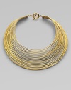 Totally simple and totally fabulous, this striking collar is gracefully formed of delicate brass wires with a polished finish.BrassLength, about 16Drop, about 8Toggle closeImported