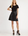 Leather is at the top of nearly every fall must-have list. This dress, featuring a buttery leather skirt, flawlessly fulfills the sartorial requirement. Round neckShort sleevesPrincess seamsLeather circle skirtConcealed back zipperAbout 21 from natural waistPonte bodice: 71% cotton/24% nylon/5% elastaneSkirt: lambskin leatherDry clean by leather specialistImportedModel shown is 5'10½ (179cm) wearing US size 4. 