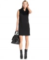 Calvin Klein's mixed-media dress is chic in all black and features a soft, sweater-like cowl neckline and faux leather trim at the pockets.