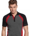 With a fitted style and bright color blocking, this polo shirt from Alfani RED is a modern take on a favorite.