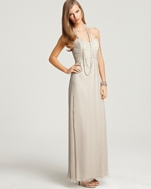 Turn heads in this impossibly elegant silk gown from Amsale. A stunning choice for your next glam affair.