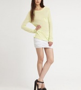 Lightweight, ultra-fine design featuring draped sleeves and a petite front patch pocket. Crewneck Semi-sheer Front patch pocket Rayon Hand wash Imported