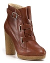 A shearling lining adds secret warmth to Loeffler Randall's cool, leather-wrapped booties.