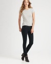 Dark-wash skinnies with lots of stretch can be perfectly paired with a fitted tee and high-impact shoes for the ultimate in downtown cool. THE FITSkinny fitRise, about 7½Inseam, about 31THE DETAILSButton closureZip flyFive-pocket style98% cotton/2% polyurethaneMachine washMade in USA of imported fabricModel shown is 5'10 (177cm) wearing US size 2.