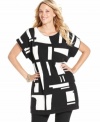 An abstract print electrifies Alfani's short sleeve plus size tunic top-- complete the look with leggings.