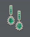 Elegance in emerald. These envy-inducing drop earrings exude brilliant color with pear and square-cut emeralds (2 ct. t.w.). Round-cut diamonds (1/4 ct. t.w.) and a 14k gold setting add extra shine. Approximate drop: 3/4 inch.