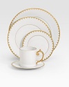 A stunning dessert plate in fine Limoges porcelain, made entirely by hand and finished with individually-applied 14k gold filet border. From the Aegean Filet Collection Porcelain 9 diam. Dishwasher safe Imported 