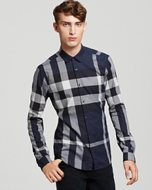 Classic navy meets its match with Burberry's timeless check. Classic navy meets its match with Burberry's timeless check.