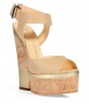 Luxe wedge sandal in supple, beige and gold leather - Peep-toe and double, 1.75 platform - Shiny hardware buckle adorns adjustable ankle strap - 6 cork wedge heel with metallic leather colorblock detail - Leather sole with rubber insert. Elegant neutral upper creates the appearance of a longer, leaner leg - Pair with a wide-leg, high-waisted pant, a classic pencil skirt or a wrap dress