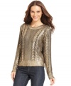 MICHAEL Michael Kors' cable-knit sweater took a dip in luxe metallic for a shimmering finish.