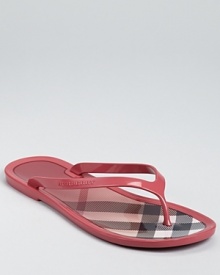 Burberry's signature check print lines the footbed of these laid-back summer sandals.