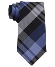 Playful plaid on this Kenneth Cole Reaction tie makes a modern statement against any classic cut. Playful plaid on this Kenneth Cole Reaction tie makes a modern statement against any classic cut.