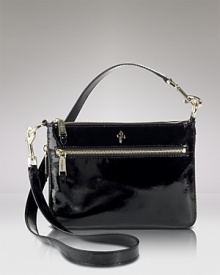 Opt for a on-the-go ease with this versatile crossbody bag from Cole Haan. In patent leather with convertible straps, it shines round the clock. Opt for a on-the-go ease with this versatile crossbody bag from Cole Haan. In patent leather with convertible straps, it shines round the clock.