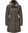 Military-inspired details inform this fitted fur-trimmed down coat from Peuterey- Hooded, large fur collar, concealed front zip closure with front button placket, long sleeves, slit pockets at chest, flap pockets at waist, slim fit, thigh length - Wear with a cashmere pullover, skinny jeans, and shearling-lined boots