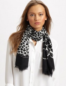 A taste of the wild with this animal print design with hand-made, fringed edges. SilkAbout 55 X 55Dry cleanMade in Italy A taste of the wild with this animal print design with hand-made, fringed edges. SilkAbout 55 X 55Dry cleanMade in Italy