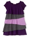 Little Ella's cap sleeve dress features bold, on-trend asymmetric ruffles in different hues. Pairs perfectly with a variety of leggings.