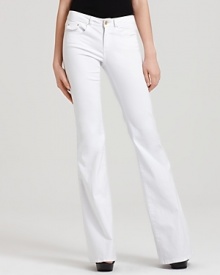 These Rachel Zoe flare-leg jeans prove white isn't just for summer and '70s-inspired style is having a moment. Work the look to the hilt: a silk tie-neck blouse and towering platforms should complete with retro cool. These Rachel Zoe flare-leg jeans prove white isn't just for summer and '70s-inspired style is having a moment. Work the look to the hilt: a silk tie-neck blouse and towering platforms should complete with retro cool.