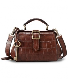 Give in to your animal instincts with this croc-embossed leather bag from Fossil, featuring brasstone hardware and signature detailing. Convenient crossbody strap keeps hands free for easy access to pockets and compartments within. Give in to your animal instincts with this croc-embossed leather bag from Fossil, featuring brasstone hardware and signature detailing. Convenient crossbody strap keeps hands free for easy access to pockets and compartments within.